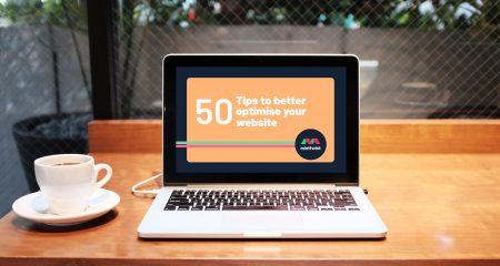 '50 tips to bette optimise your website' by MintTwist on MacBook