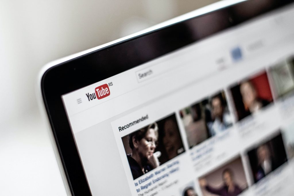 close up of a laptop screen on the YouTube home page